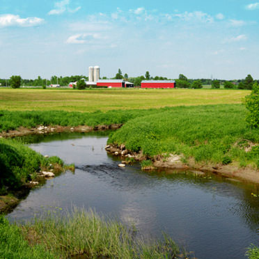 River by a farm